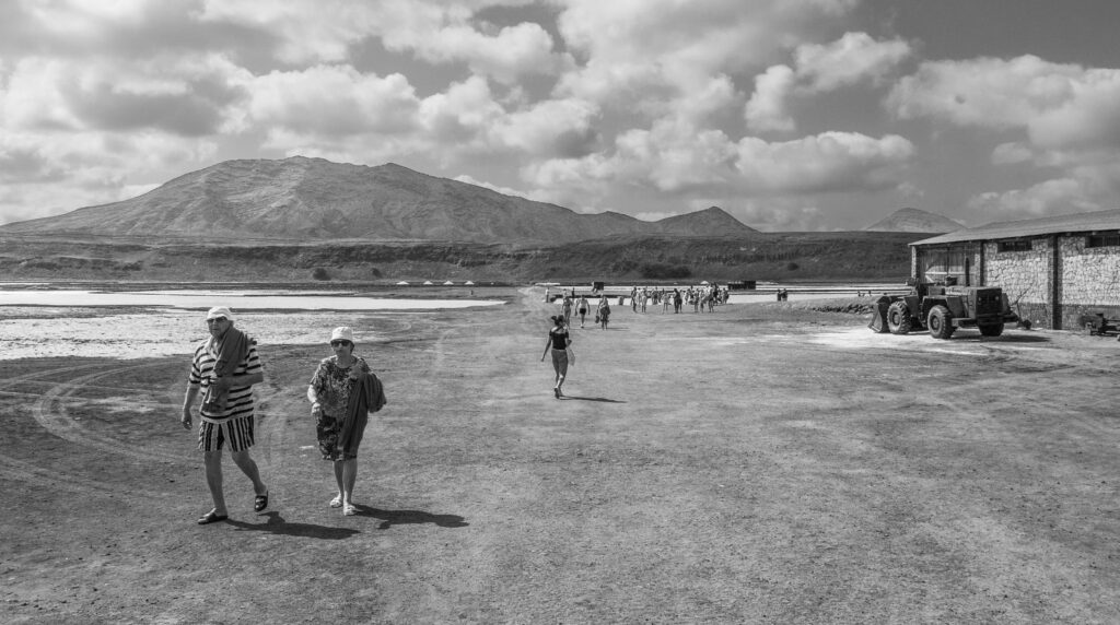 The old salt mines of Cape Verde being visited by tourists.